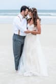The perfect dress for our beach wedding! Our guests were gushing with compliments and the photos turned out great. The multiple layers give the dress a dramatic effect. Note: I usually wear a small but had to order an XS. - Jessica B.