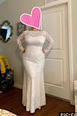 I originally ordered the 2X, and it was too big, was easily exchanged, and this was a perfect fit! Made for me! Wearing with 5 inch platform sandals. I feel snatched and sexy! Stretchy material. Shows your collar bone perfectly. Lace covers arms and under arms area comfortably. Totally ecstatic about this dress! - Mary H.