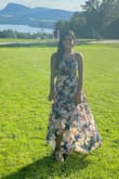 This dress is so cute! Bought it for an outdoors wedding. I got many compliments. It fits perfect. I'm usually size 2 and I got a xs. I loved it! - Angeka I.