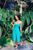 Dress was fantastic material and hugged in all the right places. I don't have a larger chest so the top area was a little loose. Aside from that, the dress was a beautiful emerald color and I got compliments all night long. - Averie B.