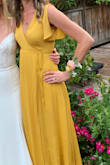 This bright and flowy dress adjusts to fit well and could be dressed up or down. Exactly what I was looking for. - Catie D.