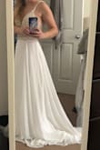 THIS DRESS IS BEAUTIFUL! Long story short I purchased both a size 0 and a 2 (they frequently go out of stock) and have tried them both on. The 0 fits me better, it's just a tad loose in the bodice and the length is very long. Easy alterations that shouldn't be too costly. I plan to wear this for my wedding next August and I cannot wait! The beading is amazing and the bodice is sheer, which isn't too obvious with my light skin. I will likely have the front lined for modesty, but it is beautiful as is and I love the low back! As I mentioned, the length is long (I'm petite so there's no surprise there) but I want to keep the length in the back for a train. Also, the shipping was extremely fast and Lulus offers free return shipping within 10 days if for whatever reason you aren't satisfied. 10/10 would recommend! - Katherine B.