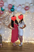 The color of this pink dress is beautiful and very vibrant. I ordered a large, but could have sized down since it is a wrap style dress and is more adjustable then most other dresses - Christina V.