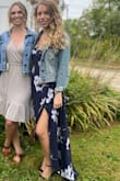 This dress fits and flows great but runs long! I'm on the shorter side so this is not uncommon, but even with heels, it dragged on the ground (The photo was after having it hemmed). Would still recommend, fit is flattering and comfy (I'm even 4 months pregnant) and will wear this many times! - Ellen T.
