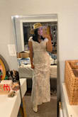 So beautiful and fits like a glove. Obviously needs to be hemmed, but such a beautiful dress! I have a shorter torso so the top is definitely not cropped, but I prefer the modesty of it looking like one piece. 100% would recommend!! - Italia A.