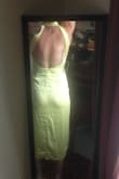 I loved this midi dress. The material is soft but wrinkles easily. The hem cuts right at my calves, so wearing heels is a must. The back of the dress is stunning. - Sarah M.