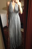 I loved this dress, but it shrunk a little after one wash.The material isn't amazing, but it is good for casual settings. I regret not getting the S. The halter tie is cool, because you can tie it many different ways! Sorry the picture quality is quite poor. - Sarah M.
