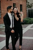 I wasn't sure if I would want to wear my wedding dress all night. I didn't want two wedding dresses. A friend said to get a black jumpsuit, when I saw this it was risky but I rushed it and it came in just before the wedding. It was perfect, I got loads of pics and could not be happier. It was comfy. And all the girls had lulus dresses and I have never been disappointed with my orders from Lulus. I felt sexy and like this fit so perfect! - Shauna B.