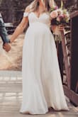 I was 30 weeks pregnant when I wore this dress for our wedding and it was super flattering. It had enough room in the belly area for growth but it was fitted in the bust area. The quality was flowy and had some nice weight to it. I received lots of compliments! - Heather D.