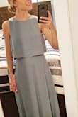 My original order was actually a group of three dresses so that I could pick one as a bridesmaid dress. I included this one more for variety's sake and I ended up REALLY loving it! It fits my small, narrow frame very well (I ordered an XS). My only complaint is that for my 5'4" self, the dress was really, really long. A little bit of hemming, however, and it's perfect! I had to brighten my picture so you could see the length, but the color is true and the fabric feels well-made. - Erika J.