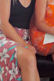 Looovvveee this skirt! Photographs best when sitting down so that the slits fall in place and show your legs. When standing, it just look like a straight skirt. It has a drawstring waist so can easily go up or down in size. - Brittany A.