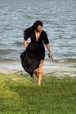 I love this dress! Definitely worth the purchase, IMO. Snug in the right places but loose and flowed beautifully. I received many compliments in this dress. I ordered a medium & the size worked out great. - Sheilena N.