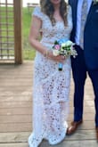 I ordered a small and it was true to size, I felt so comfortable and beautiful. I was asked by multiple people where I purchased the dress from. - Anna T.