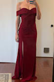 This dress looks great and fits really well. The only issue was the length being way too long. Off the shoulder sleeves are constricting but that's to be expected with this style. - Deirdre C.