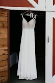 This was the second dress I bought because I ended up not loving my first wedding dress and it was literally 1/3 of the price. I felt so pretty wearing it. The only alterations I had to get were new bra cups because they were to small for my DD, shortened the straps, got it hemmed 3ish inches and a bustle put on. I would buy this dress over and over for any occasion I could wear it for. You won't regret buying it. I ordered a size 6 for myself. - Kallie W.