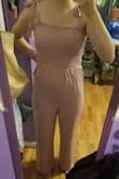 The fabric feels nice and soft against your legs and its cute. looks a little weird around the butt, but not too bad. Overall I think it looks good. - Hannah R.