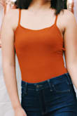Fit a little snugged, but I knew a medium would be too big. I enjoyed it and wore it for my birthday party! - Yasmine
