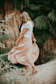 I wore this skirt for my engagement photos and I love it! So comfortable, and my photographer and I had a lot of fun with the movement of the flowy skirt in the photos. It is a bit longer then I was expecting, but since I'm so tall I considered that a bonus! - Jackie F.
