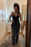 I absolutely love this bodysuit, clearly since I now own it in every color. However, the sizing was a bit tricky. The x-small white was waaaay too small. I went to an Medium and it's perfect. Same with all my other colors except for this black. The top portion and straps of the black bodysuit are not as fitted/supportive as the other colors and the XS actually fits just right, if not just a tad bit loose up top. I'm a 32D so it's not that I'm super small chested. That being said it took me a few tries and exchanges to get the right sizes but it was well worth it as I love this bodysuit and plan to wear it all year long despite the fact that I live in an area that is cold 3/4 of the year :) - Christina H.