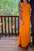 I bought this dress for a wedding. I don't normally wear a lot of color (usually in all black,) but after reading the other reviews, I just had to get it and take the risk of being too colorful. I got SOOOOO many compliments. It fit absolutely perfect! If you're my height, you'll have to wear heels as it is a bit long, but wasn't an issue. The material is thick, but still breathable as it was a humid 85 degree day in Texas at an outdoor wedding and I felt fine! The ONLY thing I would change would be to add a slit up the side for a little more sass. :) If you need a confidence boost, BUY THIS DRESS!! - Kassandra S.