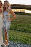 This dress fit me perfectly, I put that it was a little large because for someone who is an actual XS this might be a little big but I can usually do an XS or a S. I love this dress. It has a double lining so it doesn't cling to your body. The color is exactly like the photo. The straps are adjustable. All around in love with this dress. - Karley S.