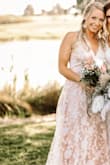 The bust is a little big for a small. I wore a extra padded bra and It fit perfectly!
I'm 5'6 and the dress is very long, perfect for someone tall. 
Overall I got so many compliments. The underneath part of the dress is actually tan. Not as pink as on the model. Overall very beautiful dress! - Erin E.