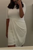This dress is super cute and elegant. I loved the material of the dress! It was perfect for me since I purchased this dress for my confirmation - Vanessa L.