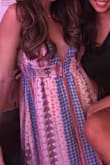 This dress is so cute and comfortable. A little busty for larger breasted girls. I am on the shorter side and didn't have to get this hemmed if I wear with wedges. Only thing I don't like is tying the straps is difficult because they are so long. - Alexandra