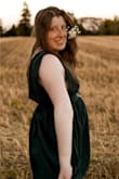 I got this dress to wear to my brothers wedding and then wore it for a fun photoshoot. The top was a little too large for me and I think I might have tried a small for that reason if I had more time. It fit perfectly in the waist but the shoulders wanted to fall off of me. It wasn't too loose not to wear though. Loved the dress! - Adrianne S.