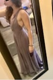 I'm 5'2 so needs a hem of course. I'll probably add a slit, too, so that I don't drown in fabric. The waist is snug but fits, and the shoulders are loose. The ties are purely aesthetic but it does have some rubber to stick to the shoulders. I may get them tailored as well. Will post another picture after it's tailored! - Sofia S.