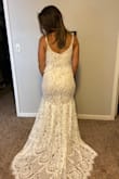I am very short and muscular, so clothes tend to always fit me weird, but this dress fit me perfectly! I definitely need have the inner slip hemmed a few inches, but other than that, it's absolutely perfect! I can't wait to wear it for my wedding = - Meg N.