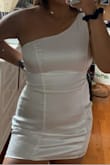I bought a medium and it fits perfectly! I got a lot of compliments and it's super comfortable. - Joanne P.