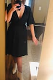 I bought this dress for a fall "cocktail" wedding, was looking for a "LBD" with a bit more coverage for cooler temperatures. Love it already! The bottom hem and sleeve shape are very feminine and flattering, while the black color and triangle pattern make it a little edgy. I will say the top is pretty low as others have said; I'm pretty small up top so it's not a big deal, but I will be safety-pinning it just in case. Feels very comfy; fabric feels quality, chiffon-type with an under layer so no see-through. I purchased a small- with my small bust and height, it fits perfect with the highest part of the dress hitting just above my knee. - Toree L.