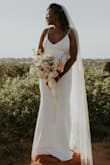 Wore this dress for our elopement. It was perfect!! No joke, the quality was the same as similar dresses I tried on at bridal boutiques. The dress was comfortable and lightweight. I loved it. - Carla B.