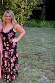 Absolutely LOVED this dress. The picture doesn't do it justice at all. It fits true to size. I loved the multiple tiers that made it super slimming. I felt so beautiful in this dress - Sarah S.