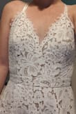 The lace is beautiful, it fits really well! The only alteration I might do it is add lining to the skirt so that it's not see thru - Mallory H.