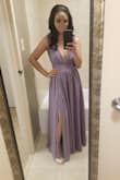 Wore this at a wedding & got lots of compliments! Had it hemmed- 5 inches off since I'm fun sized. Bc of pandemic, I was unable to get fitted and get it altered at the tailor's so I did some alterations myself for the upper area: the chest area was a bit loose so I folded the shoulder area, and used the leftover inside fabric to tie them together and make them tighter. Turned out good. Also used fashion tape to hold chest area in place. Dress is slightly heavy and fabric is easily wrinkled so keep it hung or use a steamer. Overall, definitely a wow factor! Get the dress! - Gretchen B.