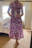 I originally ordered this dress in a small but it was too loose. The extra small fit perfectly. It's the kind of dress that could wear out to a nice restaurant or to a wedding. - INGRID S.