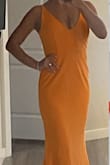 Love that the dress a it is sexy without showing too much cleavage as was my original fear, it is also tight but not too tight (might need to go down a size if that´s what you´re looking for) the color is also so vibrant! - Fernanda U.