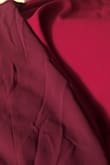The material was awesome. A bit stretchy, but it is not burgundy, more of a red. The picture added are of 2 "burgundy" dresses ordered from Lulus. I was very disappointed because this dress was ordered for a bridesmaids dress. It added more stress to everyone who ordered from this website. - Verdin V.