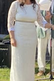 I was hesitant to order a dress online but I'm glad I did! I ordered a medium and it fit me like it was made for me. I added lace on the arms and bottom to give it a more finished look. I also added a belt for a little bling! The dress is lined and not see through! It has a little stretch to it. Very happy with this dress and would recommend it! - Chasity M.
