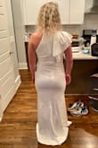 I wore this to my rehearsal dinner and I loved it!!!! Material is thick and great for spring or fall outside event. I thought it was absolutely beautiful!!
 I ordered a size L which fit me well around my larger legs but was slightly loose in my larger bust.
It was about 5' too long in both the medium and large so if you're medium height, get it altered. - Tekla T.