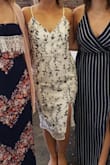 I absolutely love this dress. I wore this dress for my bridal shower, it was a hit, I don't think I've ever received so many compliments for one article of clothing. This dress fit in all the right spots and is made of great quality. I adore this dress. - Lillyanne L.