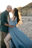 The fit of this dress was amazing and I got LOTS of complaints during my engagement shoot. I found it true to size but the V neck is very deep, so lots of boob was showing. The dress was also VERY LONG, great for photos but I need to get it cut by a least 6 inches to actually wear this out for a wedding. Overall great dress I could not have been happier. - Stefania