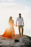 This dress is incredible! It fits true to size and looks way more expensive than it is. I wore it for our engagement shoot and I've received so many compliments. I would definitely recommend this piece. - Nicole M.