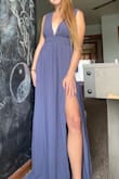 I've always struggled with finding a dress with a deep plunge that won't show my boobs to the world. Most cases, I am super uncomfortable the whole event and end up taping a whole roll of double sided tape to my boobs to make it stay. But the plunge in this dress stays in place really well and is REALLY comfortable! The only thing I struggled with was the length of the dress. You definitely need to be at least 5'7", because when you wear heels it adds an extra 2-4 inches helping it not touch the ground. Where of for me being 5'5" with a 3 inch heel, it only makes me 5'8" and the dress still hits the floor. Overall, I still do really recommend this dress especially if you're taller. If you're shorter, wear heels or go to a tailor to get a few inches off the bottom! Also.. ignore my crusty toes in the second pic I'm slacking on the pedicure oops. - Sydney S.