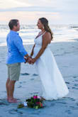 I felt so beautiful in this dress! It was a bit long, but my mom gemmed it for me and it was perfect for our romantic ring exchange - Robyn P.
