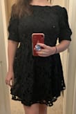 This dress is everything I've wanted in a little black dress. Much like a mullet, from the front it looks a little conservative but the back is where the party is at. I'm short and this hits me at the perfect length on the thigh, though it might be a bit short for taller people. My favorite part of this dress though is that the back is adjustable! Both the top and bottom lines have ties that you can adjust to make this dress fit like a dream! - Meagan L.