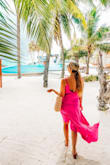 Loved this dress! I took it on my honeymoon to The Maldives and it was so comfortable and flowy to walk around the beach in! Fit is great. Material is quality, I didn't even have to wear a bra! - Monica M.