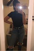Love the look of this shirt!! I'm usually a medium and I ordered a large so it wouldn't be too tight and it fits perfectly. The material is thin but not see-through. Comfy and flattering. - Rachel O.